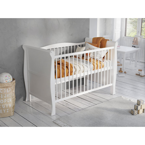 Cot with high outlet sides